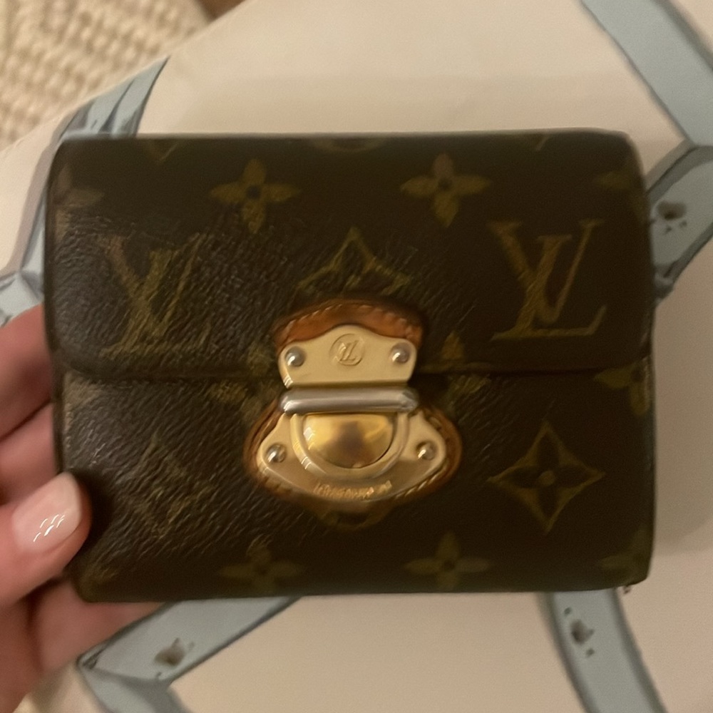 GUC LV Louis Vuitton monogram compact wallet with gold closure.